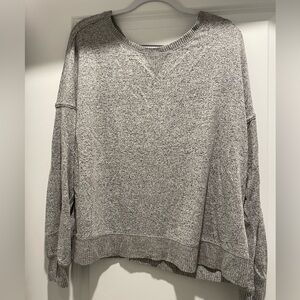Gray stars above pajama sweater